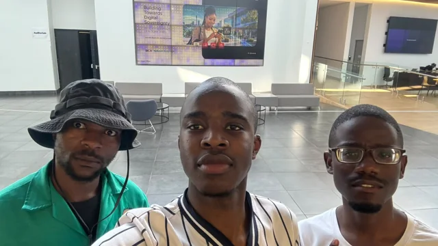 AIET IT participants posing together at a technology event