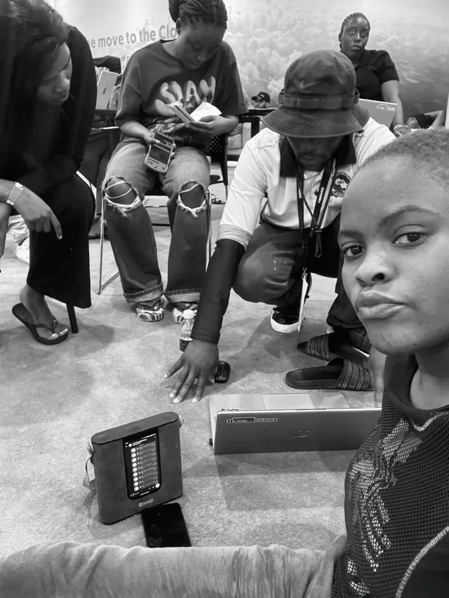 AIET IT group together during a technology activity