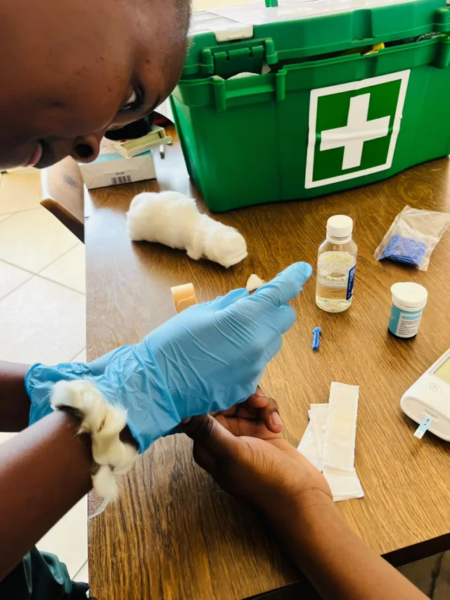 Gloved hands and equipment during an HPO practical session
