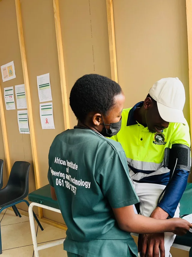 HPO learner positioning a blood pressure cuff