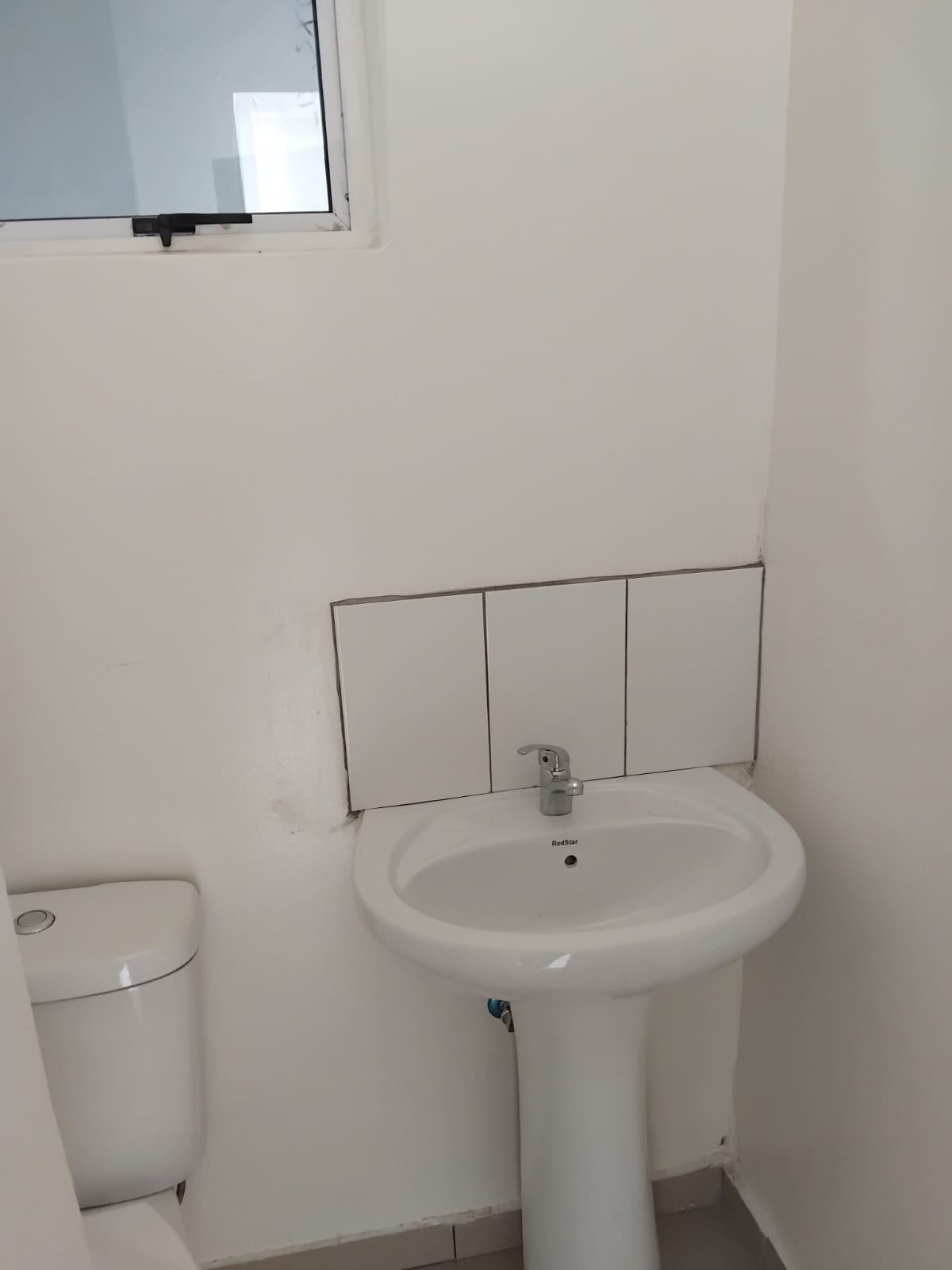 A private shower cubicle inside a student accommodation unit